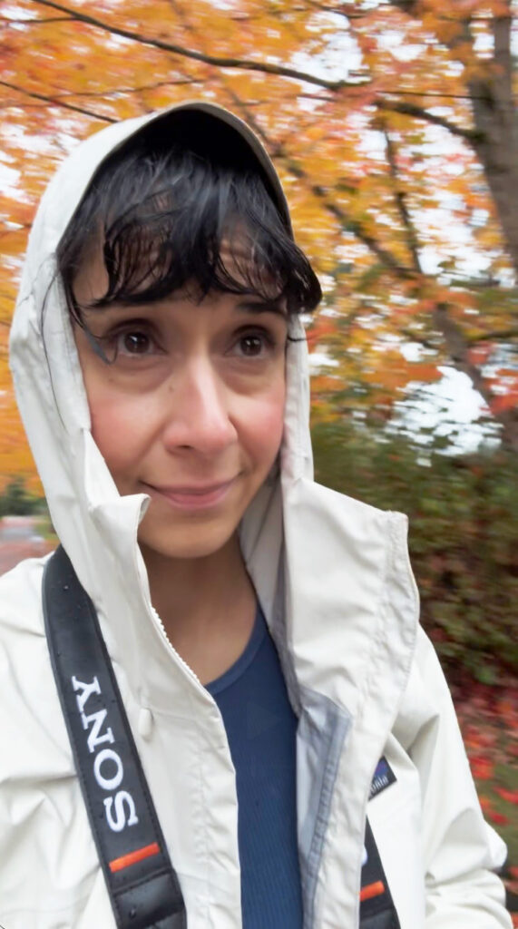 Sony photographer setting up for a family photoshoot in rainy Seattle - visibly soaked from the rain.